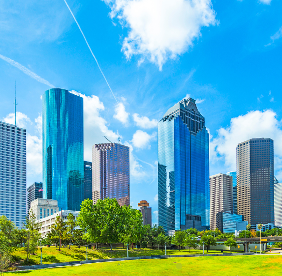 Sunny view of the Houston city skyline representing the local market for dental marketing in Houston.
